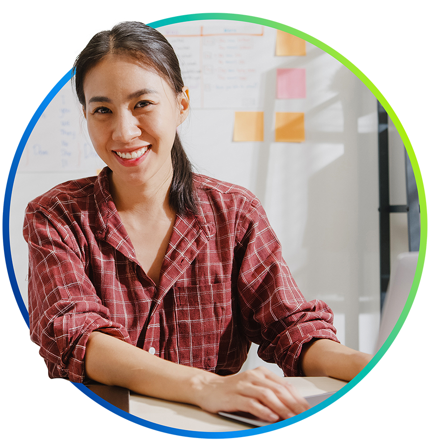 Girl smiling at computer